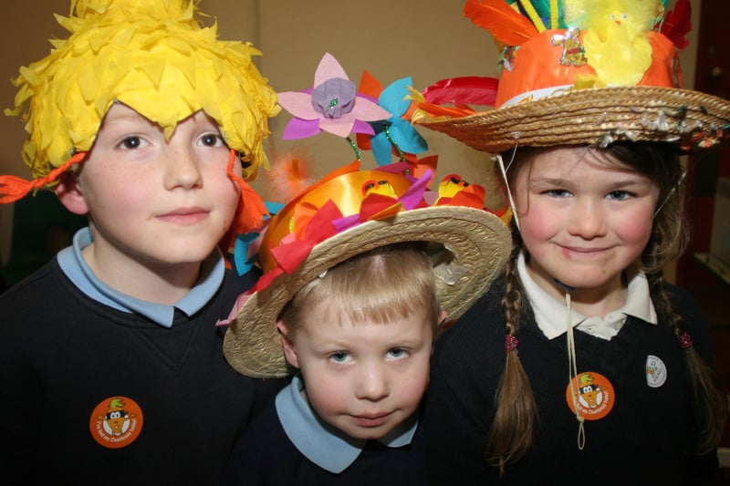 Jack Harris, Nathan East and Kizzy Andrassy  in an Easter bonnet parade at Newbold C of E School in 2007.