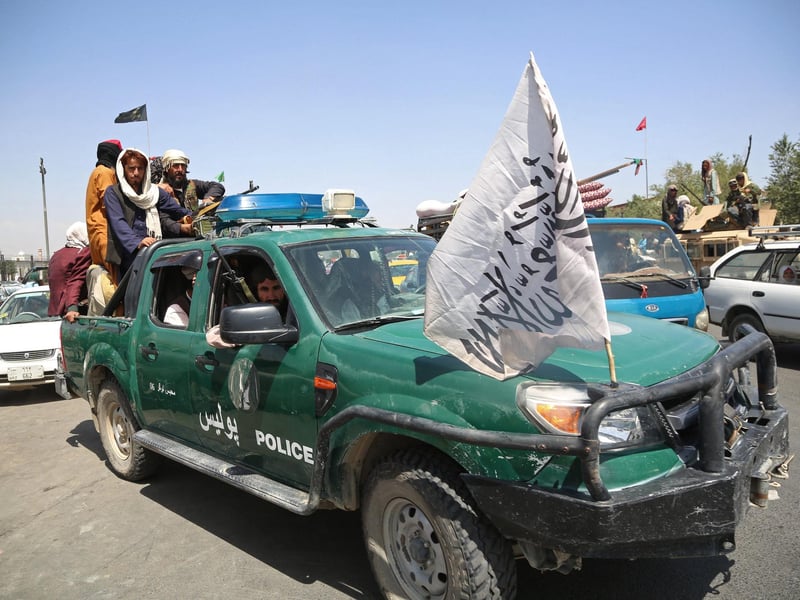 Taliban fighters patrol the streets of Kabul