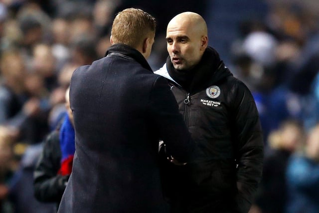 The two bosses, Garry Monk and Pep Guardiola, shake hands after the FA Cup fifth round clash at Hillsborough.
