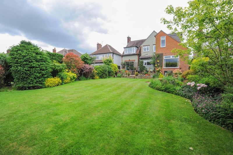 Zoopla says the home offers "a substantial beautifully landscaped enclosed rear garden, ideal for adults to entertain in and children to play".