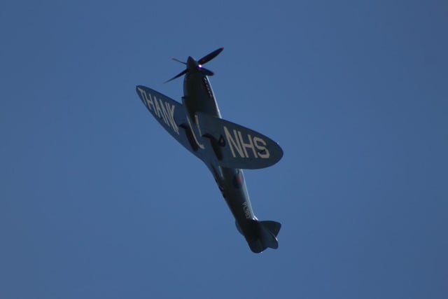 These spectacular pictures of the NHS Spitfire flying over Portsmouth were taken by Adam Jenkins