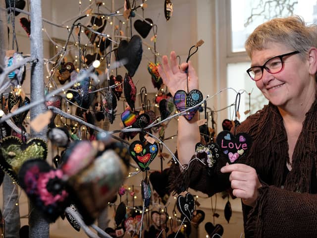 Artist Helen Birmingham with her new hearts project on display at her gallery in her home in Scarborough