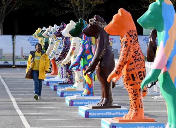 Cheryl Davidson, project manager for the Bears of Sheffield,  strolls among the bears.