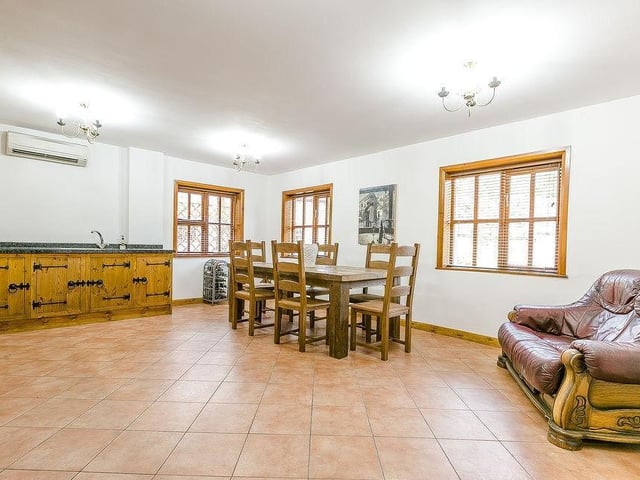 Another of the generously-sized rooms in the cottage. A mixture of space and comfort.