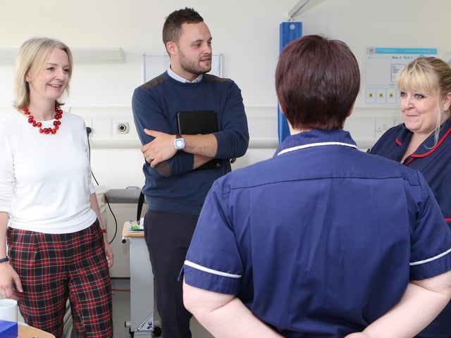 Chief Secretary to the Treasury Liz Truss and MP Ben Bradley are shown around the Community Hospital by Matron Melanie Bull