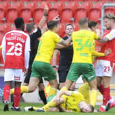 Rotherham's Angus McDonald is sent off for a challenge on Oliver Skipp
