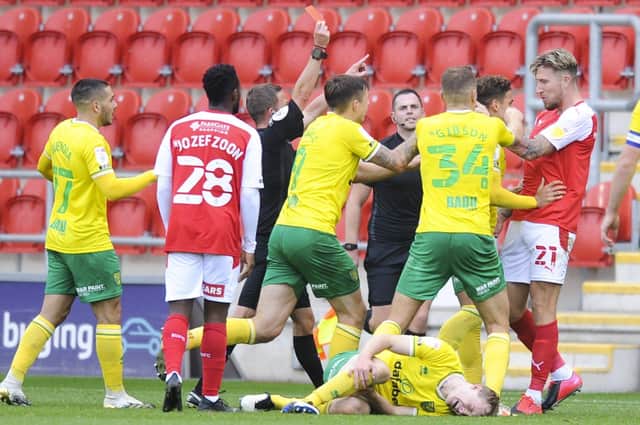 Rotherham's Angus McDonald is sent off for a challenge on Oliver Skipp