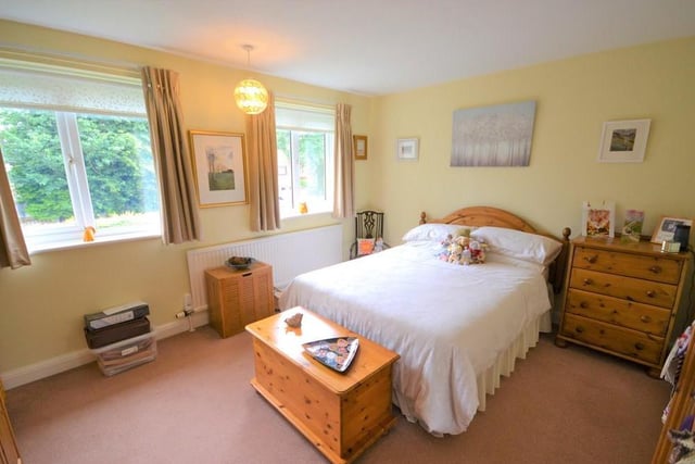 Bedroom 2 - A large double bedroom which also enjoys a pleasant view from two front facing UPVC double glazed windows, having various power sockets, central heating radiator and plenty of space for bedroom furniture.