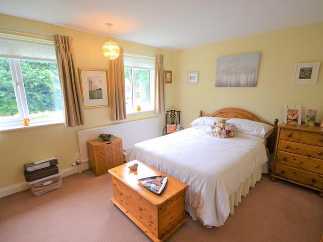 Bedroom 2 - A large double bedroom which also enjoys a pleasant view from two front facing UPVC double glazed windows, having various power sockets, central heating radiator and plenty of space for bedroom furniture.