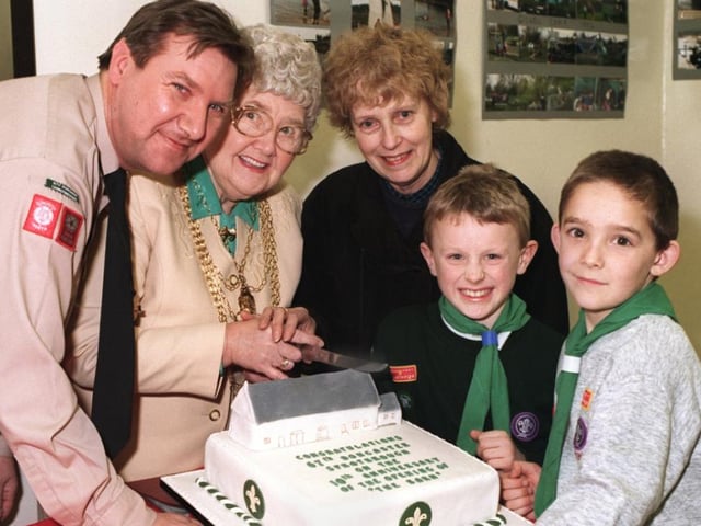 The mayor of Doncaster cutting a celebration cake in 1997 to mark ten years since the 67th Doncaster Scout Group moved into The Barn