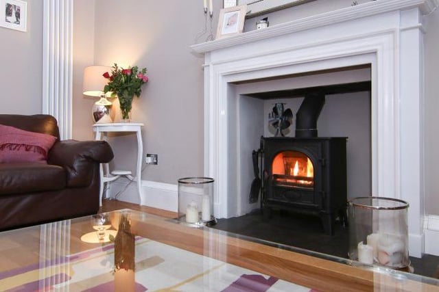 Log burner in sitting room.