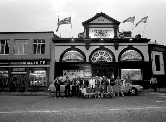 Staff dressed as gangsters beside a stretch limousine to advertise the opening of Fat Sam's Chicago-style diner and bar on the site of the Edinburgh meat market at Fountainbridge in September 1986.