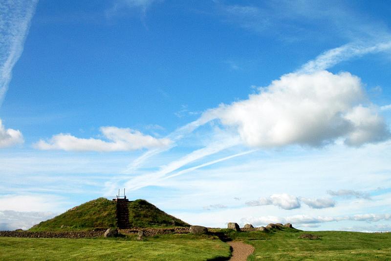 Astonishing Neolithic henge and later burial site on windy hill with views from Highlands to Pentlands. Atmosphere made even more strange by the very 21st-century communications mast next door.