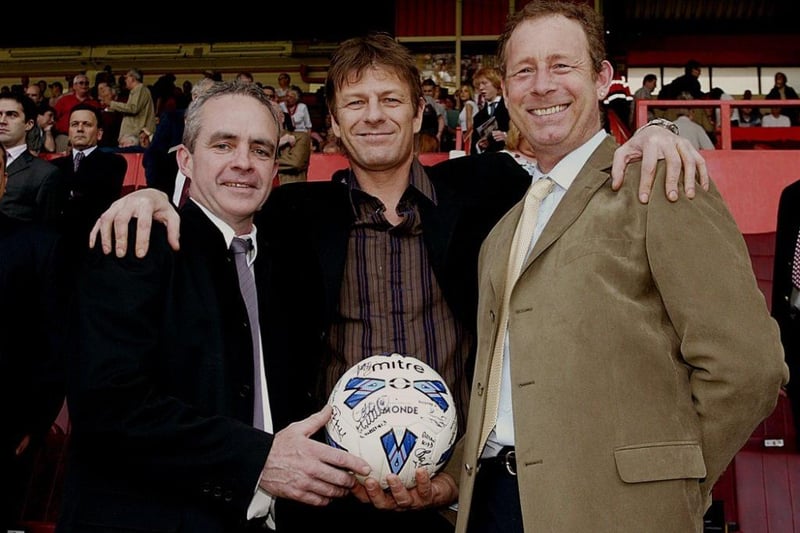 Garry Wright, right, and Telecom Sports FC secretary Andrew Johnstone receiving the Sheffield Sunday Sports League Merit Award on behalf of the club from Sean Bean at Bramall Lane