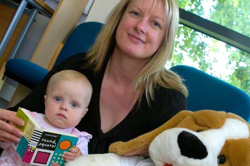 Ten-month old Phoebe Eyre from Beauchief in Ecclesall Library with mum Julie and a cuddly friend, enjoying the library's summer reading scheme, in July 2009