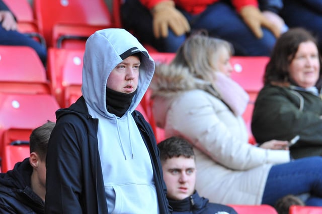 A Sunderland fan watches on at the Stadium of Light.