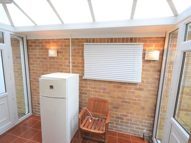 Conservatory - 10' 10" x 6' 1" (3.3m x 1.85m) A useful addition to the property providing extra space with front and rear UPVC double glazed doors, polycarbonate roof, various power sockets, central heating radiator, wall lighting and a tiled floor.