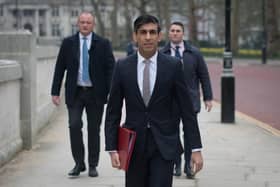 Chancellor of the Exchequer, Rishi Sunak, walks from the Treasury to No 11 Downing Street, London, the day before delivering his budget. Picture date: Tuesday March 2, 2021.