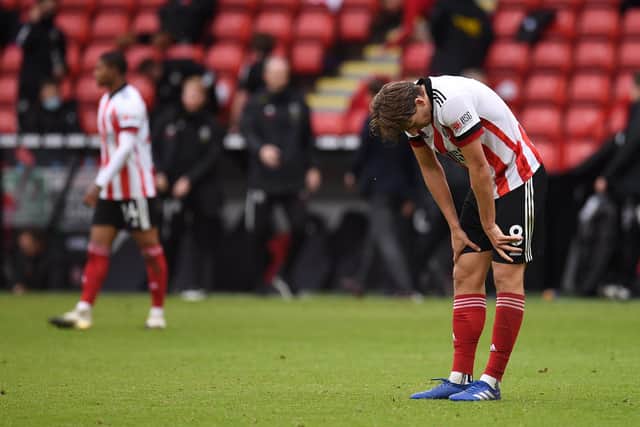 SHEFFIELD, ENGLAND - OCTOBER 18: Sander Berge of Sheffield United reacts following the Premier League match between Sheffield United and Fulham at Bramall Lane . (Photo by Oli Scarf - Pool/Getty Images)