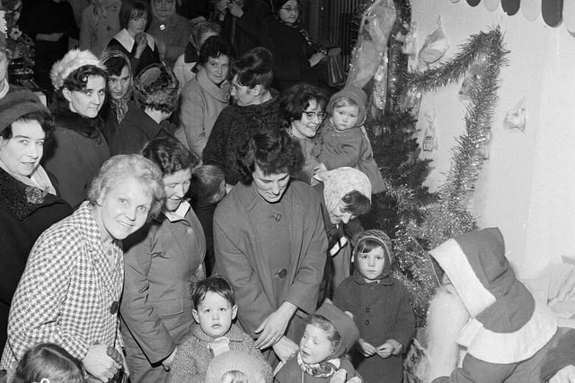 Shopper cram in to Blairs Department Store, on Nicholson Street, to do their Christmas Shopping in 1964.