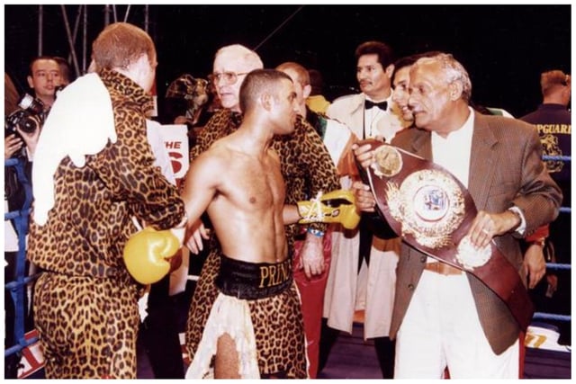 Naz being congratulated by his dad in the ring after he overwhelmed Steve Robinson in Cardiff in 1995