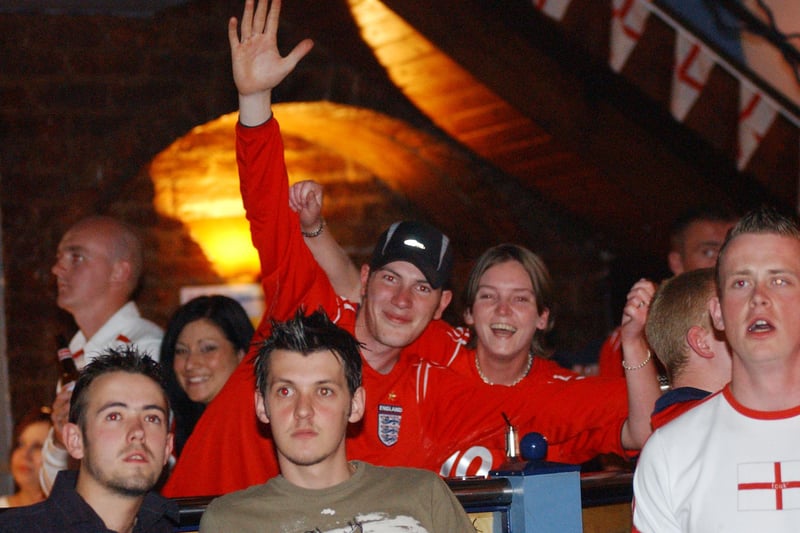 Three Lions on the shirt. Recognise these England fans?
