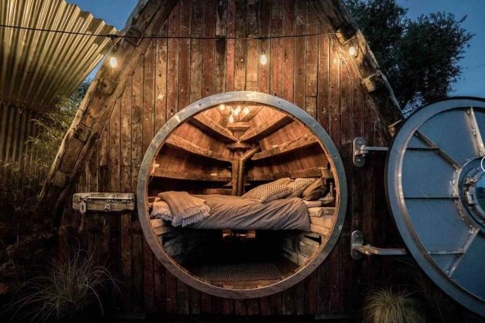 The glamping boat shack is a converted 1945 boat situated within a private forest, overlooking the amazing open fenland countryside. One person who stayed here wrote: “Incredible stay! Wish we could have stayed for longer! Beautiful, unique and very romantic.” Sutton, England.