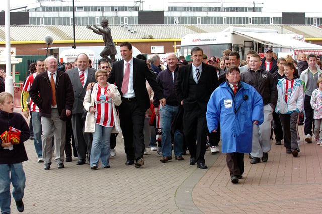 Niall Quinn with supporters on a Niall's Miles walk before the Liverpool game .... in which year?