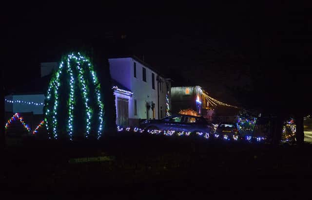 Peak District villages all lit up with Christmas lights. Tideswell