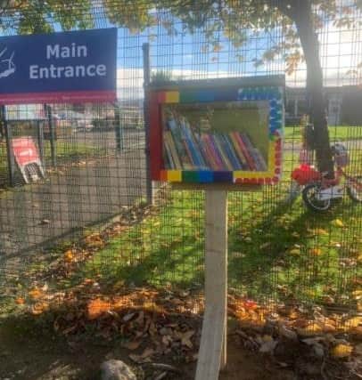 The little library outside Windmill Hill Primary School was designed and decorated by pupils.