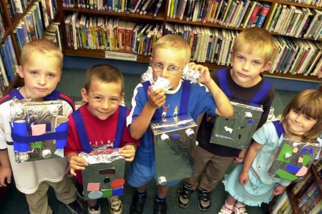 Children at Warmsworth Library in 2002 taking part in a space dress up day during the Summer.