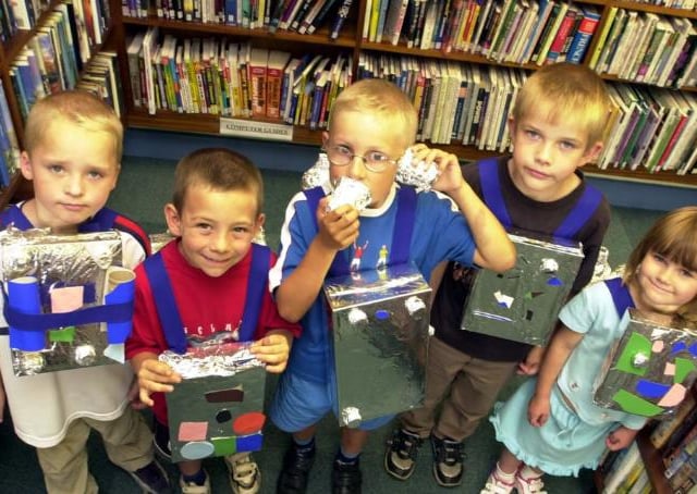Children at Warmsworth Library in 2002 taking part in a space dress up day during the Summer.