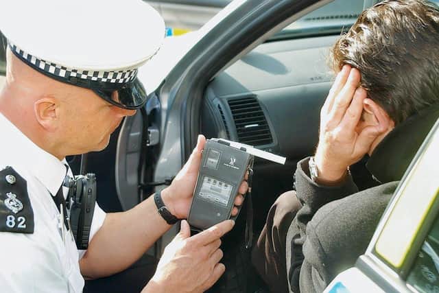 Police doing a roadside breathalyser test