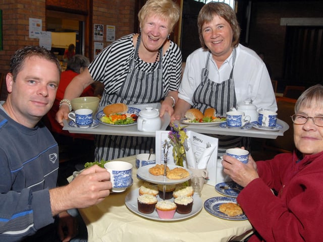 Staff at the community cafe at the Mansfield Baptist church served cakes and meals in 2011 picture shows visitors Tim Bates and his mother Jean Bates right with staff Janet Wix and Bronwen Surgey