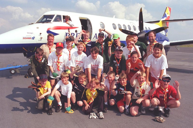 Dronfield Scouts jubilant after pulling the plane the full length orf the runway at Sheffield Airport in 1999