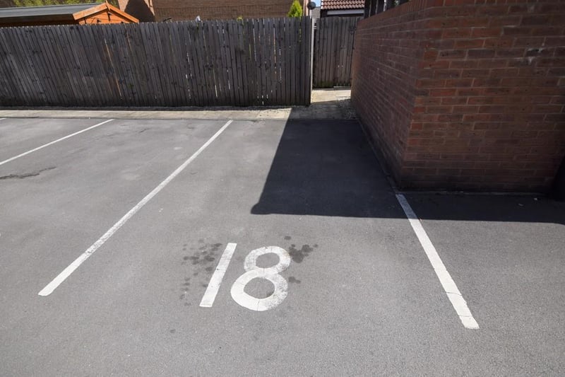 Allocated parking space next to the apartments.