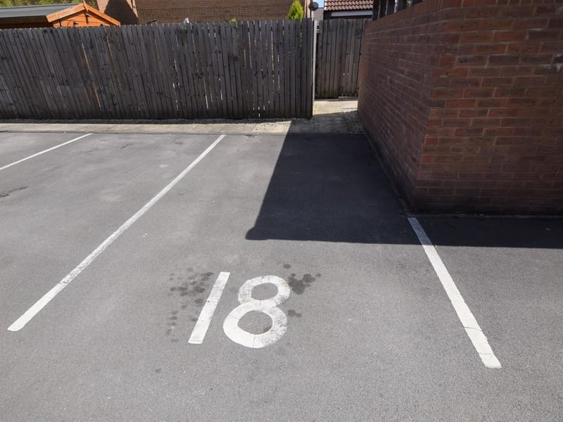 Allocated parking space next to the apartments.