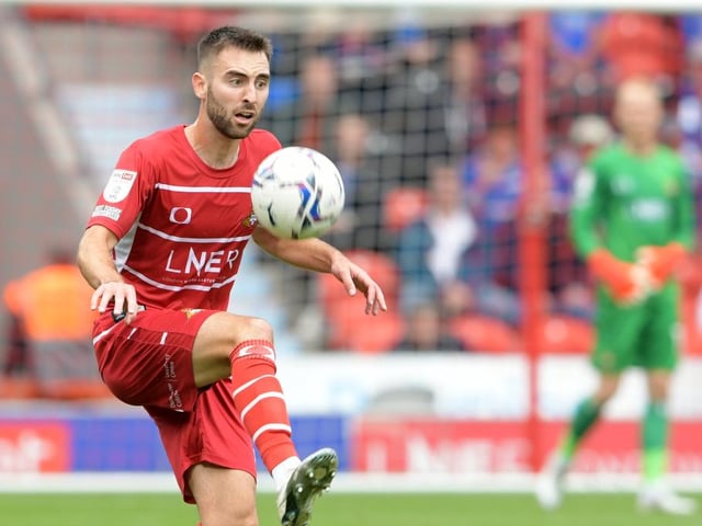 A welcome return to the side and looked to play the ball forward every time he got on it. Forced off at the break with a knee injury.