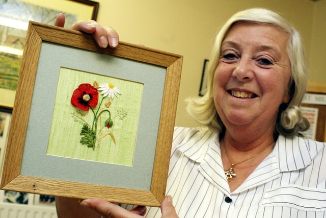 Mary Worwood of Miller's Dale and District WI with her piece of three-dimensional embroidery, known as stumpwork, which she produced on a course at Denman College in Oxfordshire in 2007
