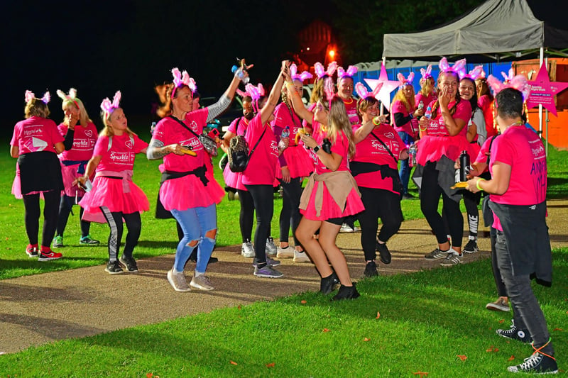 Happy participants reach the halfway stage of the Sparkle Walk.