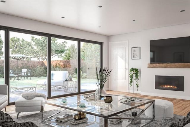 The living room will be found at the back of the house with large glass doors leading to the stunning garden and letting in tons of natural light.