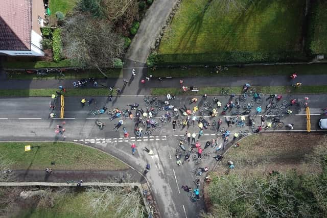Drone shot shows campaigners blocking the junction of Ringinglow Road and Common Lane.