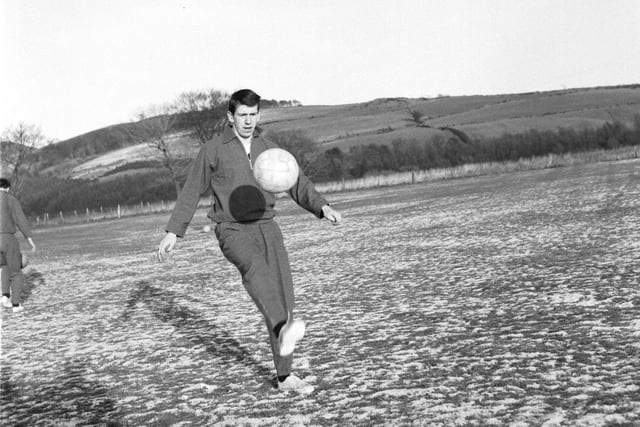 John Greig of Rangers FC training in the snow at Largs with the Scotland football squad - December 1965.