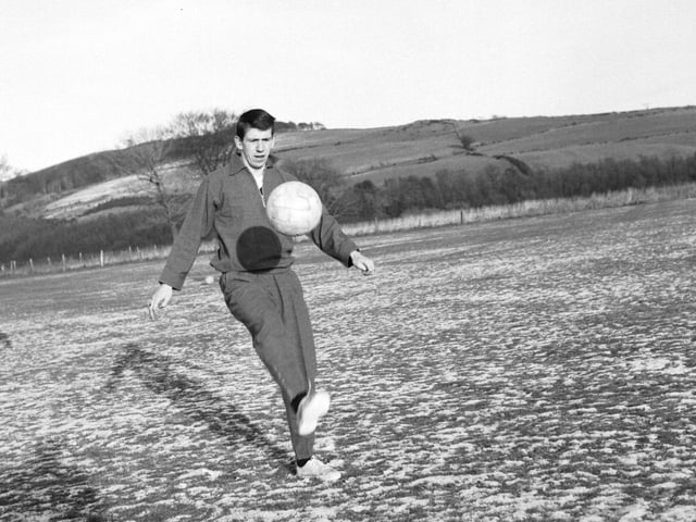 John Greig of Rangers FC training in the snow at Largs with the Scotland football squad - December 1965.