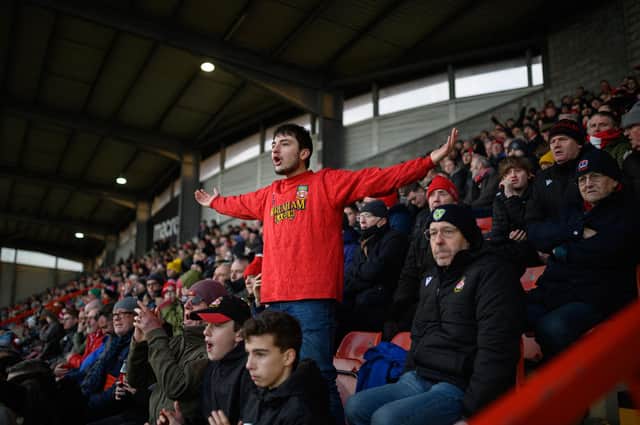 Wrexham fans will be out in force for the fourth round tie against Sheffield United: OLI SCARFF/AFP via Getty Images