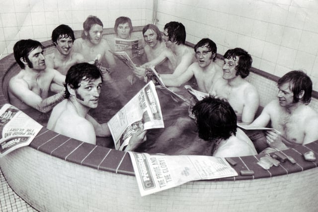 The United players read the paper and take a bath in 1971.
