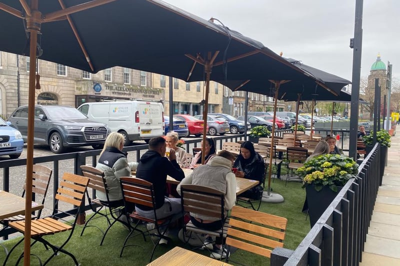 Customers in the Capital pictured enjoying a beverage as restrictions on hospitality ease. From today, Monday 26 April, groups of up to six people from six different households are allowed to meet in an outdoor seating area for an alcoholic drink.