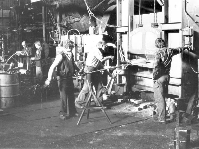 Taking a casting from a furnace during an experiment on titanium steel for Rolls Royce at Woodhouse & Rixson, Sheffield, on October 13, 1981