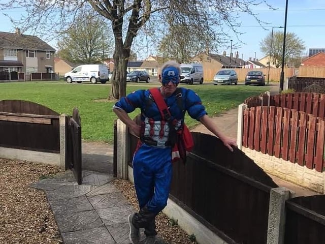 Postman David Evans on his rounds in Edlington