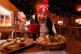 Many restaurants need a Christmas chef. Chef Andrew Pern pictured trying the Fondue in The Winter Hütte at York Christmas Market. Picture by Simon Hulme 22nd November 2022